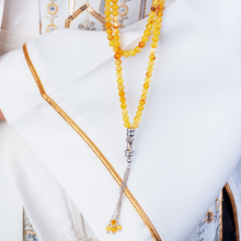 سبحة 99 حبة من الكهرمان الطبيعي وطقم فضة عيار ٩٢٥ صناعة يدوية