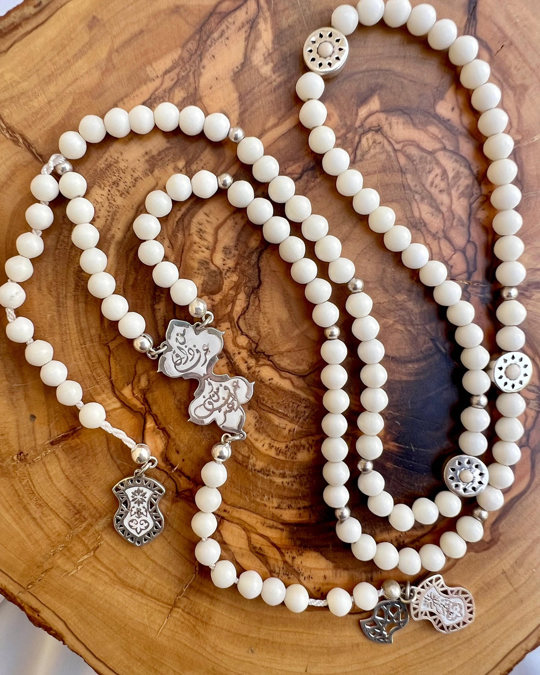 Camel bone rosary with silver