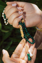 Natural ivory rosary in malachite